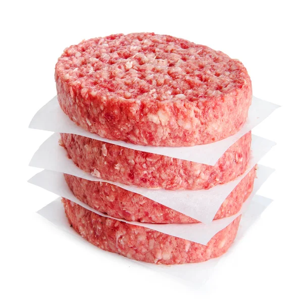 白で隔離されたハンバーガーを調理するための4つのひき肉スライス — ストック写真
