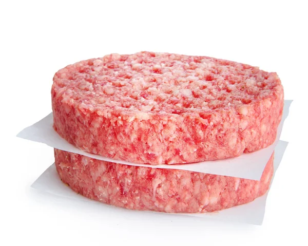 白で隔離されたハンバーガーを調理するための2つのひき肉スライス — ストック写真