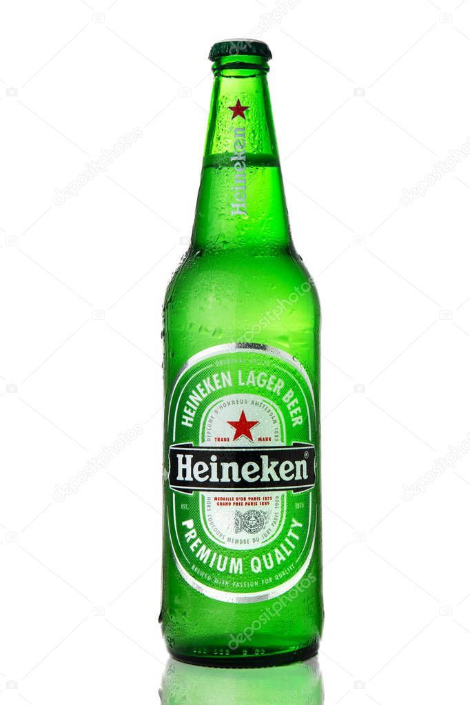 Heineken beer glass bottle, one beer isolated on white in studio, Dutch brewing company