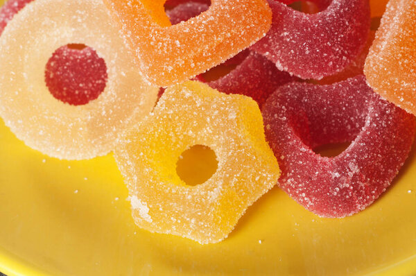 Marmalade rings on a plate, close up shot, local focus