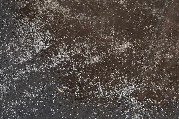 Deicing chemicals on asphalt road in Moscow