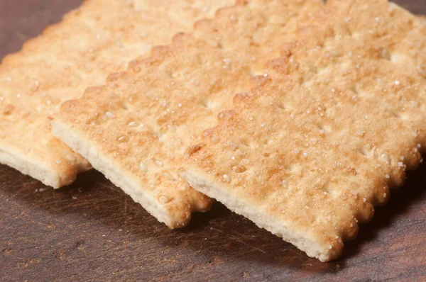 Galletas Fritas Tablero Madera Macro Shot —  Fotos de Stock