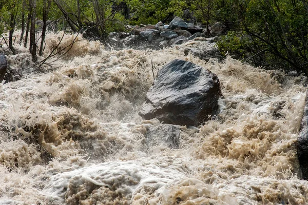 Rough river and stones — Stock Photo, Image