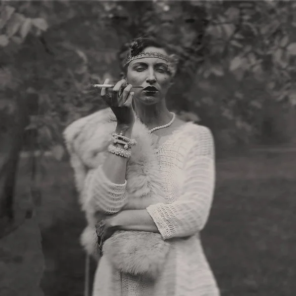 Wet-plate. Collodion photography of young woman in white vintage dress.