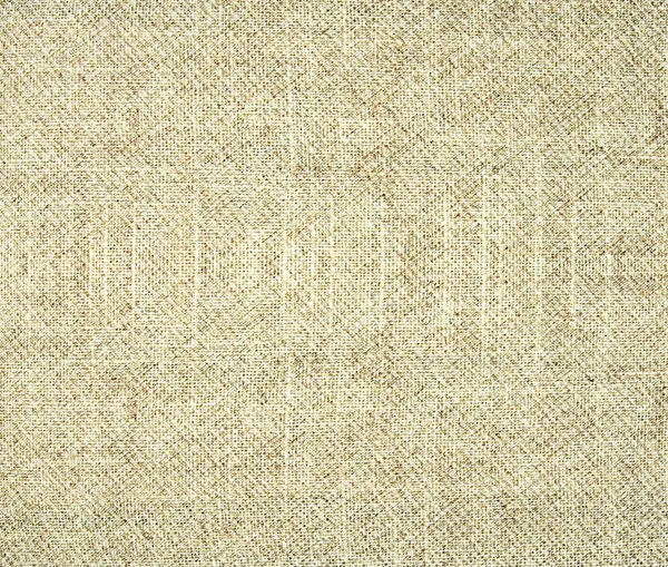 The textured beige natural fabric