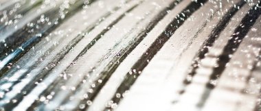 Işık şeritleri ve damlaları olan arkaplan