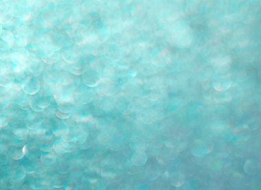 Parlayan su damlalarının turkuaz arka planı