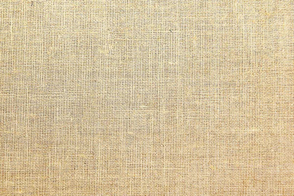textured background of beige natural textile