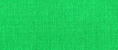 Tasarım için arkaplan olarak yeşil kumaş dokusu