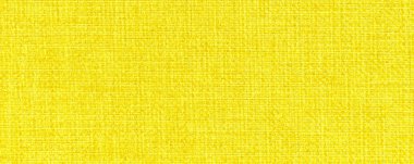 Tuval kumaşın sarı dokusu. Tasarım için kusursuz arkaplan.