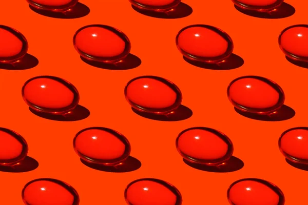 赤い背景にカラフルなシームレスなパターンの赤い丸薬のクローズアップ ハードシャドウ — ストック写真