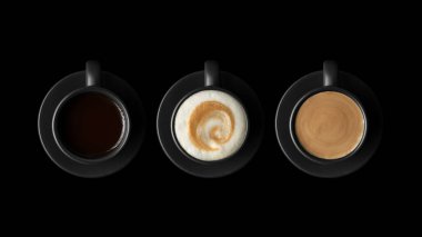 Three black cups with coffee and saucers on black background clipart