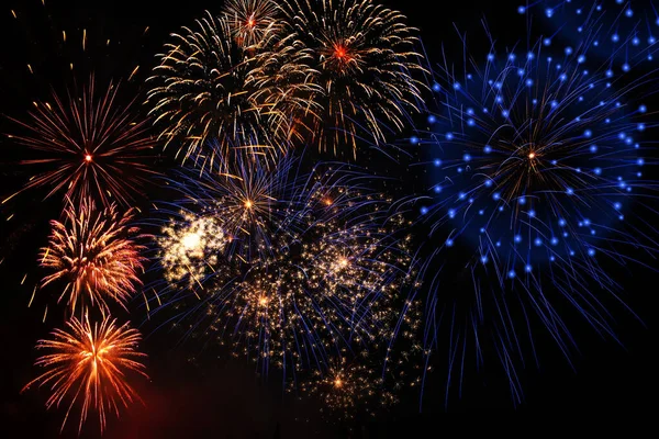 Fireworks display on dark sky background — Stock Photo, Image