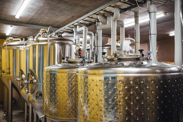 Craft beer brewing equipment in brewery! Alcoholic drink production