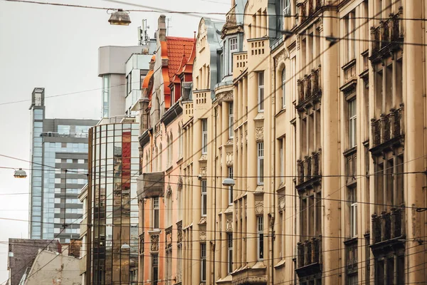 Row of buildings in city perspective view.