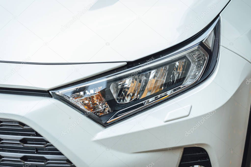 Car Headlight lamp in close up. Modern transport