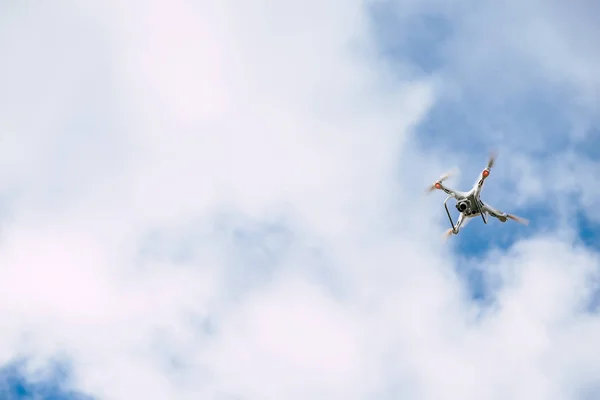 Drone flying in air and sky in the background