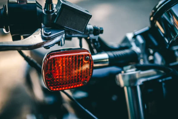 Close up view on motorcycle turning light