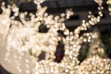 Ren geyiği Noel arka plan, bokeh arka planını altın