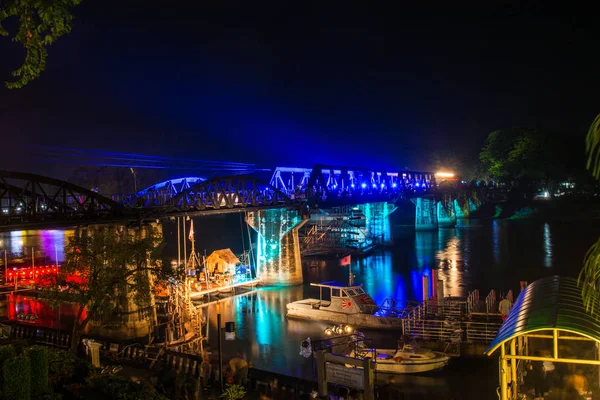 Colorful lighting  on the river kwai bridge. In a delightful festival, Kanchanaburi, Thailand