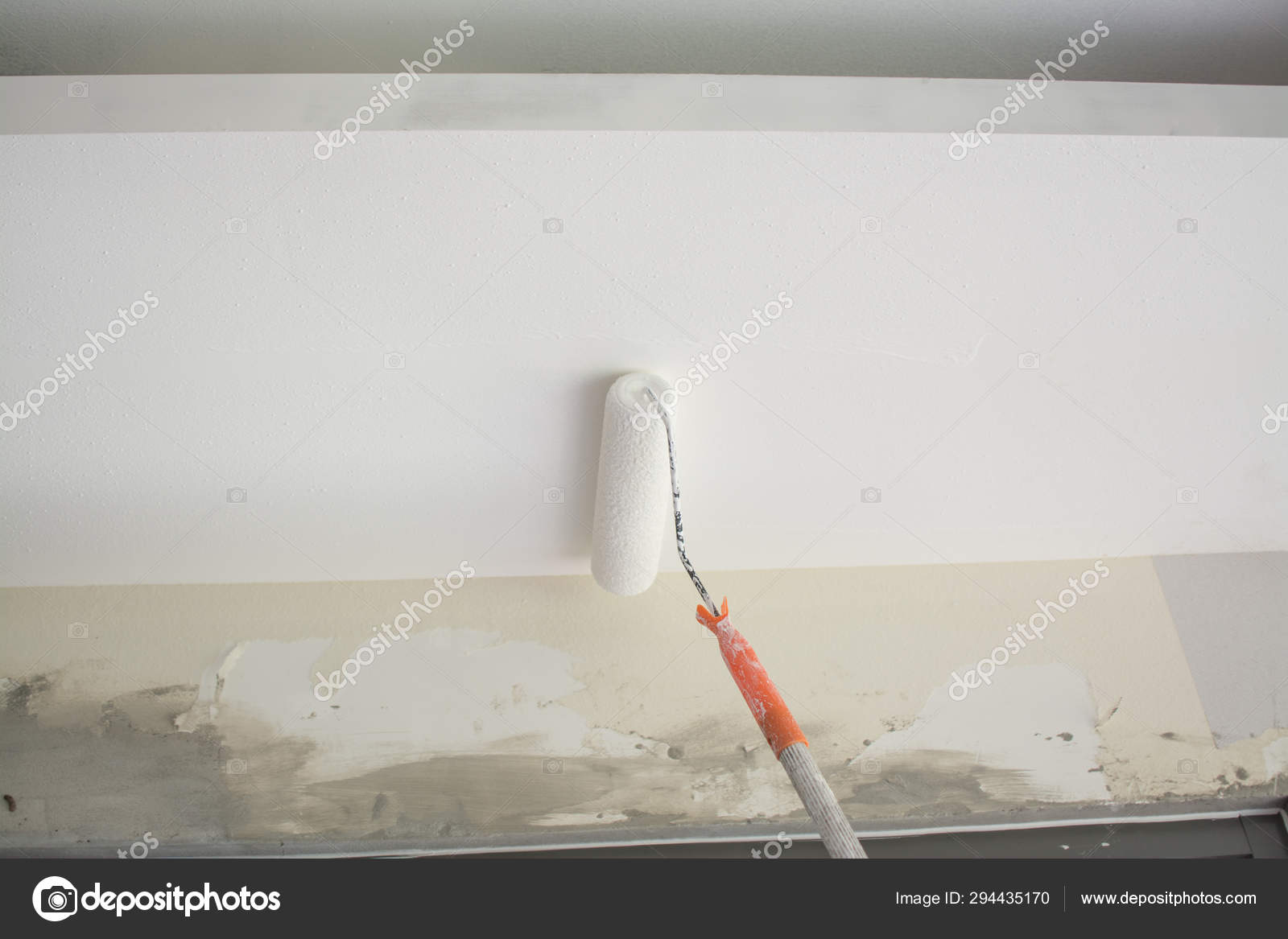 Painting A White Gypsum Plaster Ceiling With Paint Roller