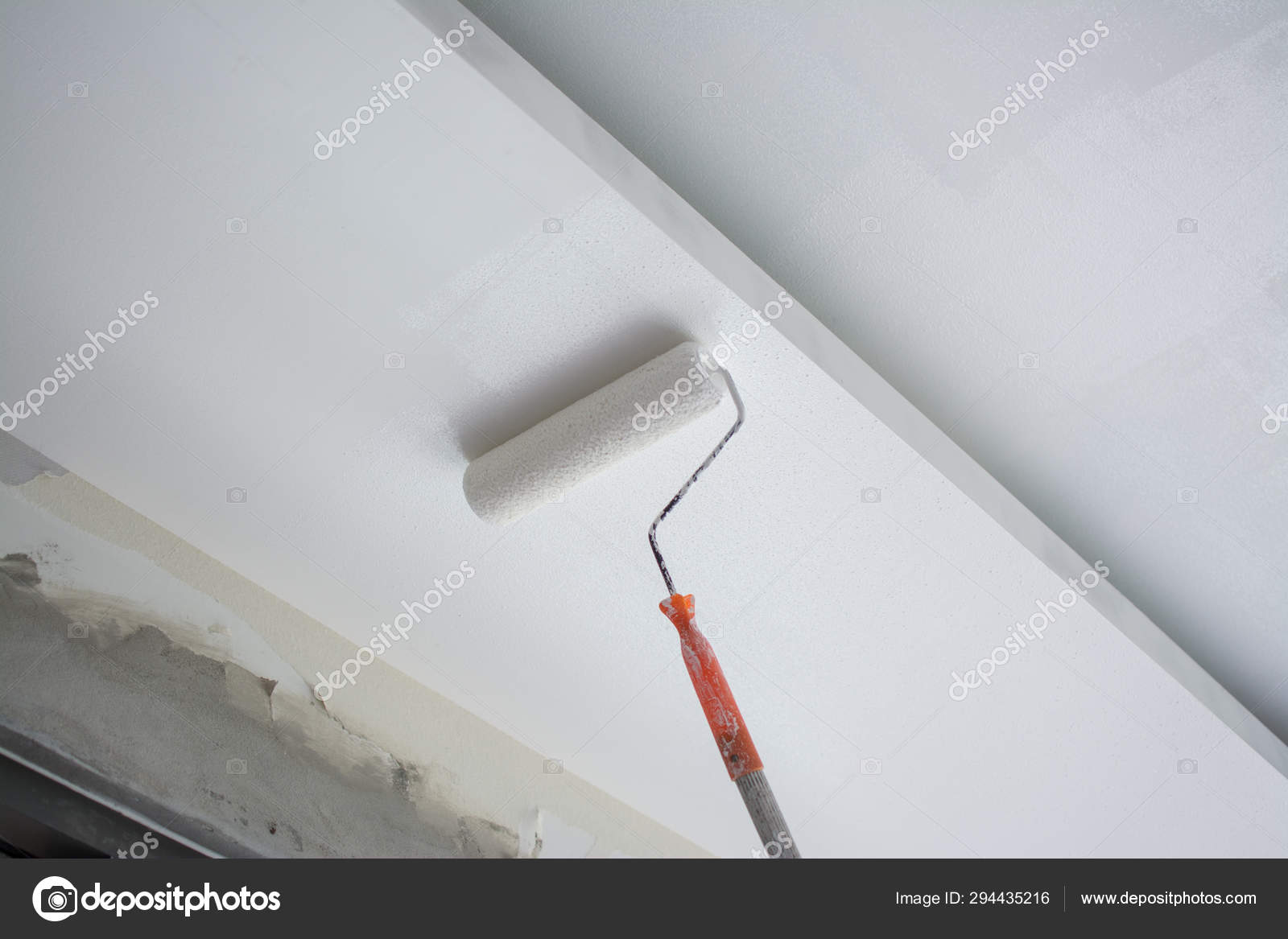 Painting A White Gypsum Plaster Ceiling With Paint Roller