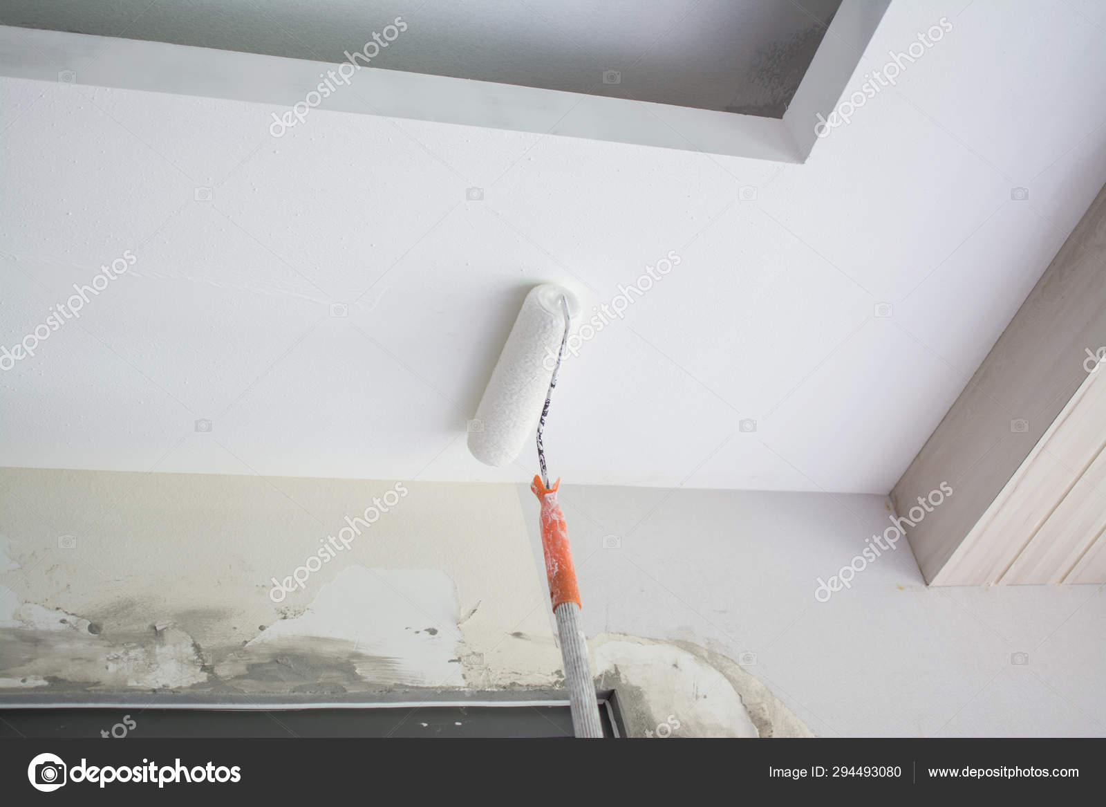 Painting A White Gypsum Plaster Ceiling With Paint Roller