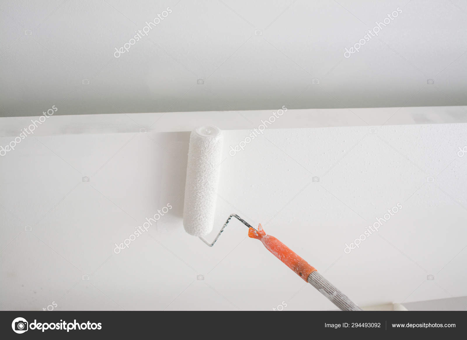 Painting A White Gypsum Plaster Ceiling With Paint Roller