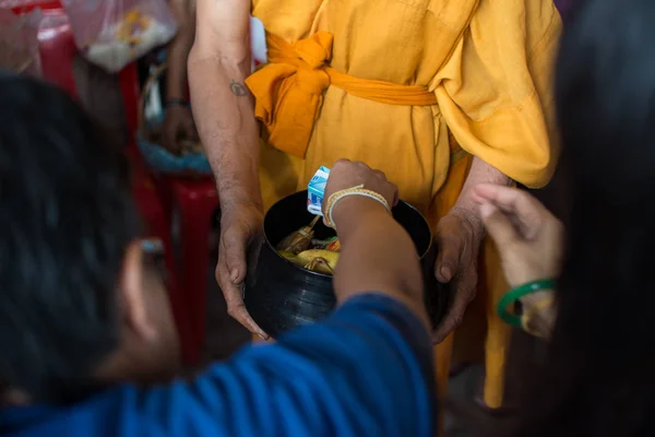 Buddhist monks are given food offering from people for End of Bu — Stock Photo, Image