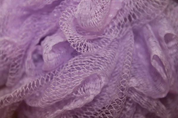 Plastik renkli havluları yakından çek. Sıradışı arkaplan.