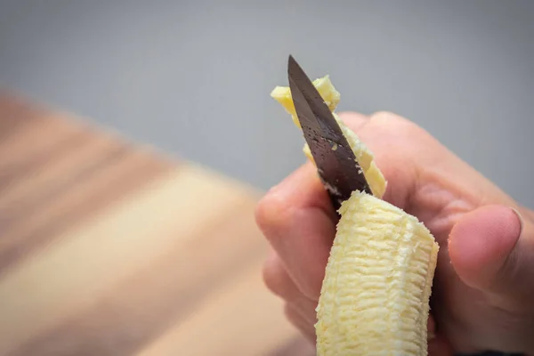 Close Banana Slices Cut Black Knife — Stock Photo, Image