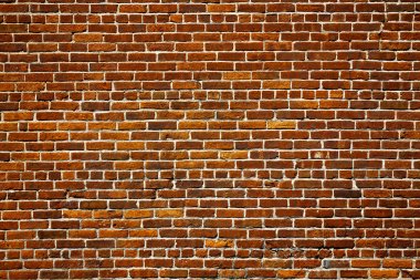 Eski kırmızı tuğla duvar.