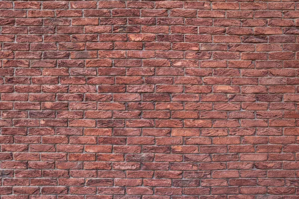 Eski kırmızı tuğla duvarın arka planı