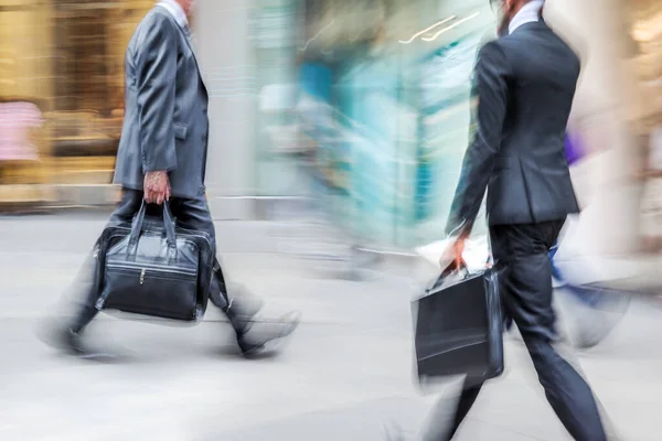 abstract image of business people in the street and modern style with a blurred background