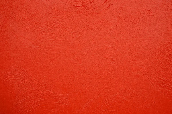 Empty red concrete wall, clean texture background surface.