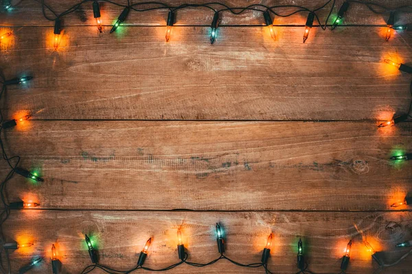 Vintage Vánoční Světla Žárovka Dekorace Starých Dřevěných Planěk Veselé Vánoce — Stock fotografie