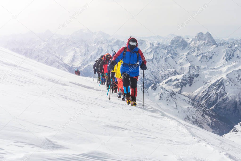 A group of climbers goes to a meeting high in the mountains.