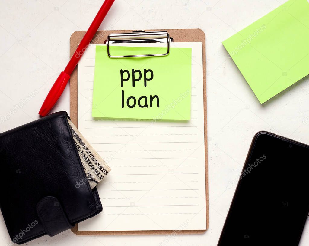PPP Loan salary protection program concept. Wallet with money on a blank copy space