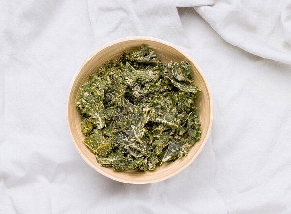 Kale chips on linen gray fabric