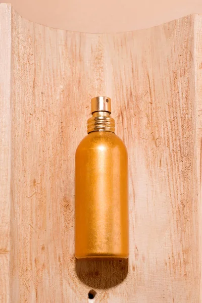 Arany Színű Parfümös Flakon Textúrán — Stock Fotó