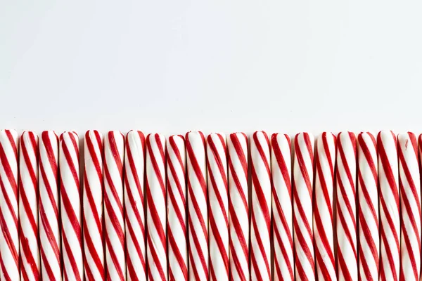 Peppermint Candy Sticks Row White Copy Space — Stock Photo, Image
