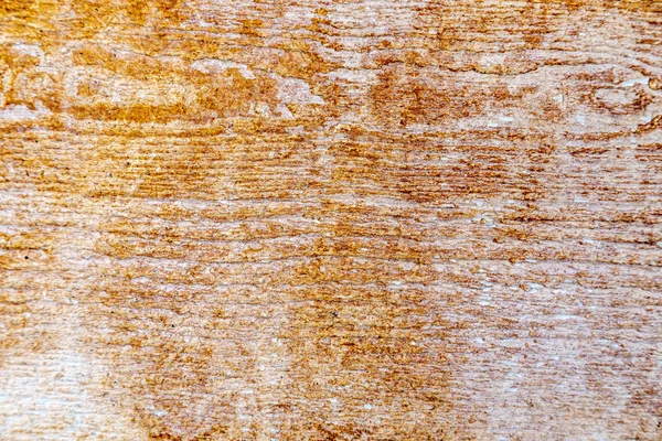 Close-up van verweerd hout met roestvlekken — Stockfoto