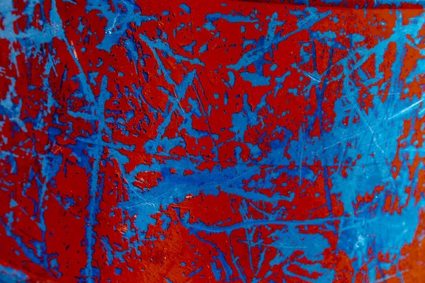 Primer plano de metal pintado de rojo y azul — Foto de Stock