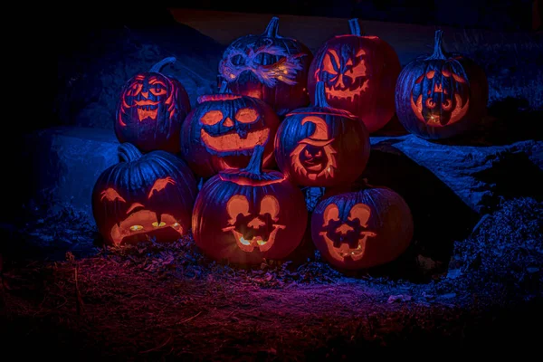 Display of candle lit Halloween lighted pumpkins — Stock Photo, Image