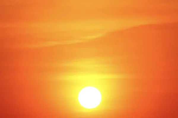 Big sun sunset orange sky background.