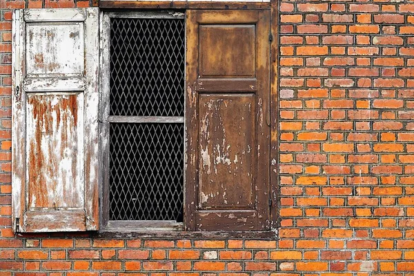 Old building walls over 100 years  old brick old window