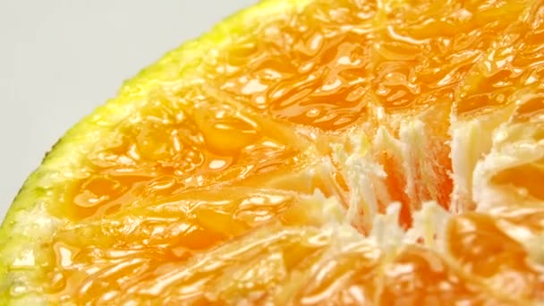 4K Marco záběr pomerančového ovoce a rotate.Close up maso citrusové pomeranče. Pozadí přírody.