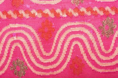  100 yıldan daha eski renkli Tayland el sanatları Peru tarzı halı yüzeyi. Doğal malzemelerden yapılmış eski, yırtık, kimyasal malzemelerden yapılmış. Yakın çekim..