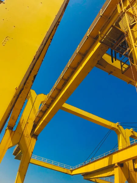 Shipping cargo to harbor by crane. Stock Picture