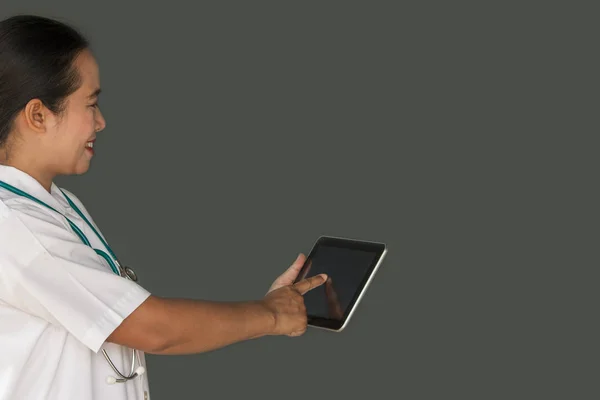 woman doctor with digital tablet isolated on gray background